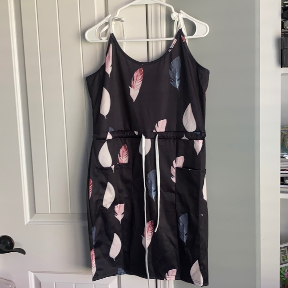 Large dress, swim cover with feathers tie at waist and shoulders